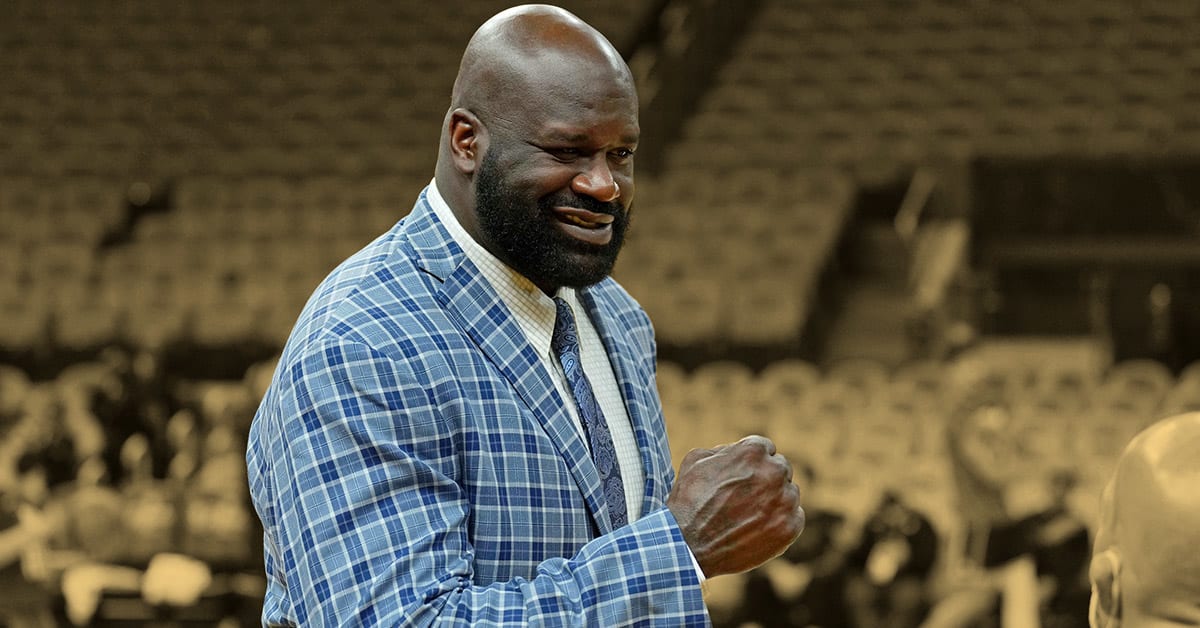 Retired NBA star Shaquille O'Neal prepares to throw balls to spectators as  gifts before an NBA exhibition game between Sacramento Kings and Brooklyn N  Stock Photo - Alamy