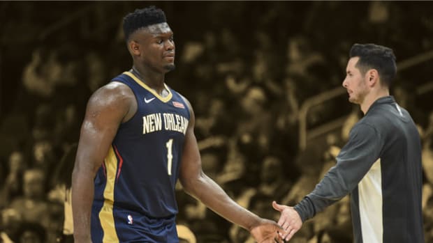 New Orleans Pelicans forward Zion Williamson shakes hands with guard JJ Redick