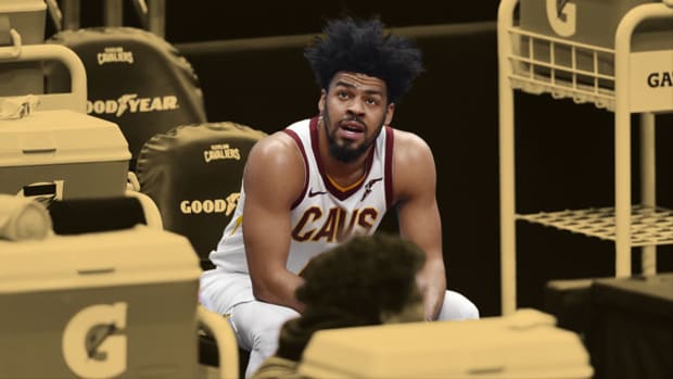 Cleveland Cavaliers guard Quinn Cook sitting on the bench