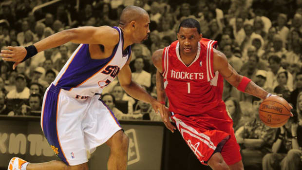 Houston Rockets guard Tracy McGrady and Phoenix Suns forward Grant Hill