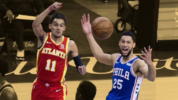 Trae Young reacts to Ben Simmons passing up the wide open layup against him