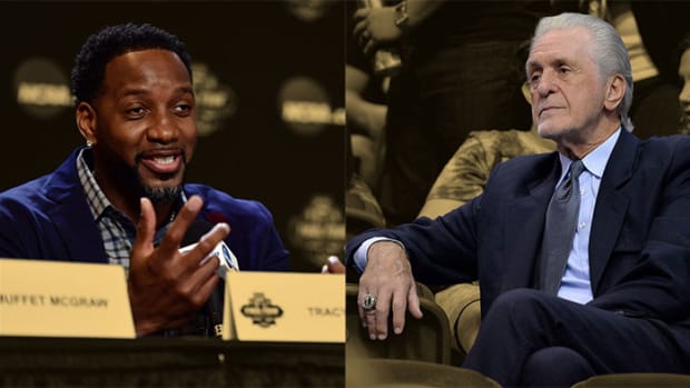 NBA former player Tracy McGrady and Miami Heat president Pat Riley