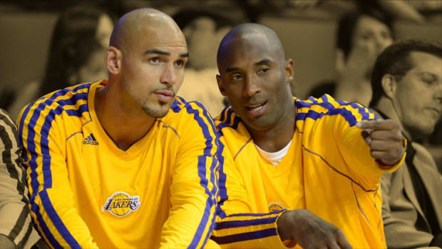 Los Angeles Lakers forward Robert Sacre and guard Kobe Bryant