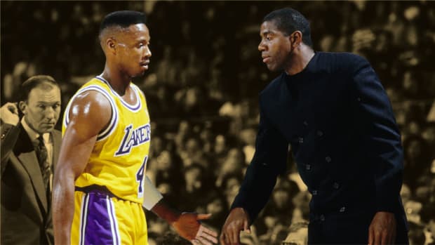 Los Angeles Lakers guard Magic Johnson and guard Byron Scott