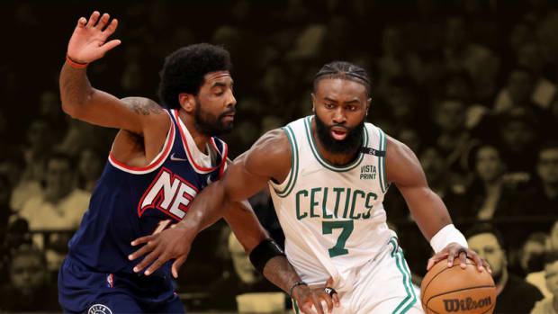 Boston Celtics guard Jaylen Brown and Brooklyn Nets guard Kyrie Irving