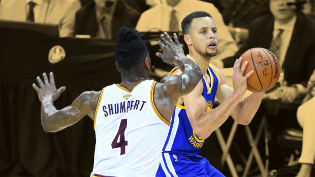 Golden State Warriors guard Stephen Curry and Cleveland Cavaliers guard Iman Shumpert