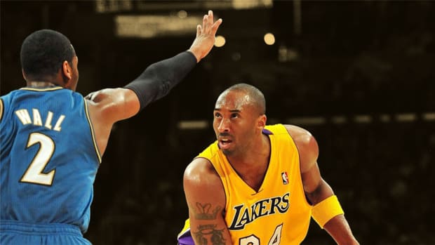 Los Angeles Lakers shooting guard Kobe Bryant and Washington Wizards point guard John Wall