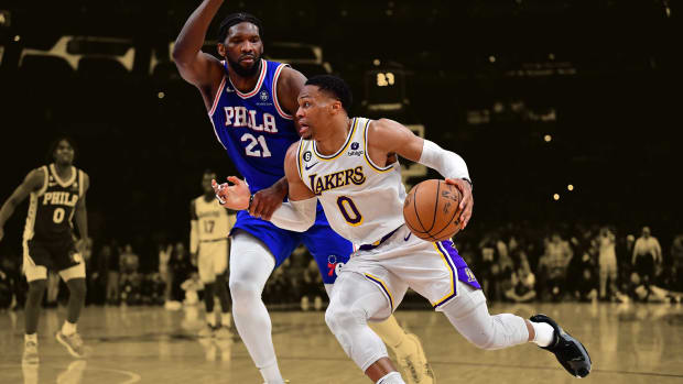 January 15, 2023; Joel Embiid defends Russell Westbrook on the last play of the Philadelphia 76ers' 113-112 win over the Los Angeles Lakers at Crypto.com Arena