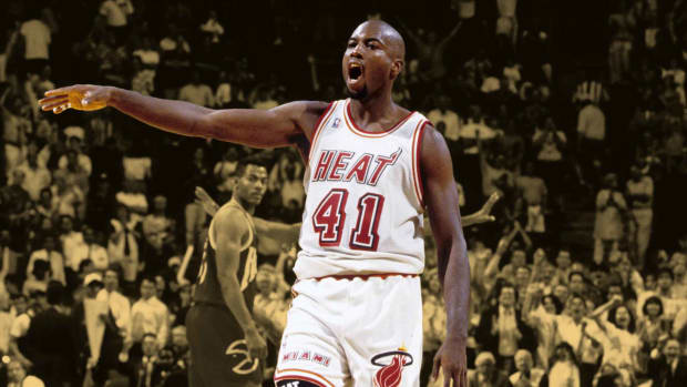 Miami Heat guard Glen Rice reacts after hitting a 3 point jump shot during the 1995 season against the Atlanta Hawks at the Miami Arena