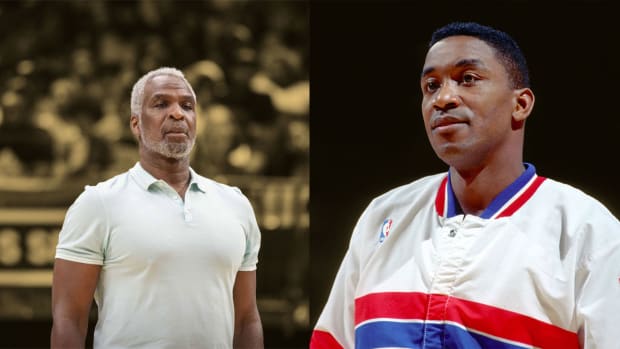 Detroit Pistons guard #11 ISIAH THOMAS in action/Charles Oakley during the game a