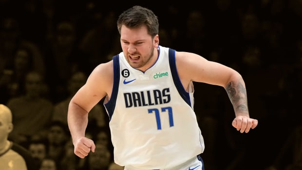 January 26, 2023; Dallas Mavericks guard Luka Doncic twists his ankle during the game against the Phoenix Suns in the first half at Footprint Center