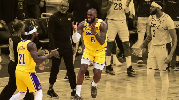 January 28, 2023; LeBron James and Patrick Beverley complain to the refs after a missed call at the end of the Los Angeles Lakers' road game against Boston Celtics