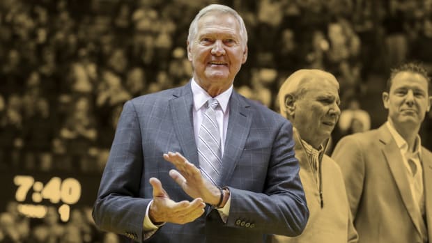 Former West Virginia Mountaineers player Jerry West is honored at halftime