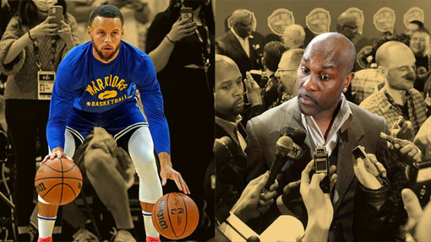 Golden State Warriors guard Stephen Curry and Gary Payton