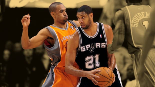 San Antonio Spurs forward Tim Duncan and Phoenix Suns forward Grant Hill