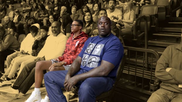 Former NBA player and current television analyst Shaquille O'Neal next to his son Shareef O'Neal