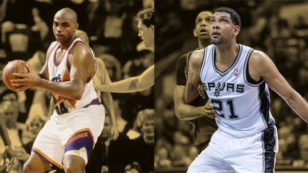 Phoenix Suns forward Charles Barkley and San Antonio Spurs forward Tim Duncan