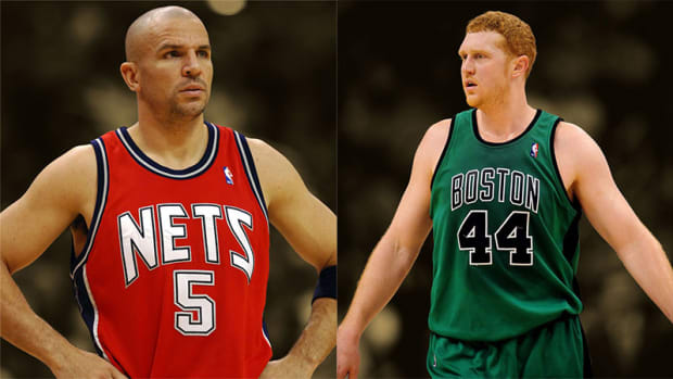 New Jersey Nets guard Jason Kidd and Boston Celtics forward Brian Scalabrine