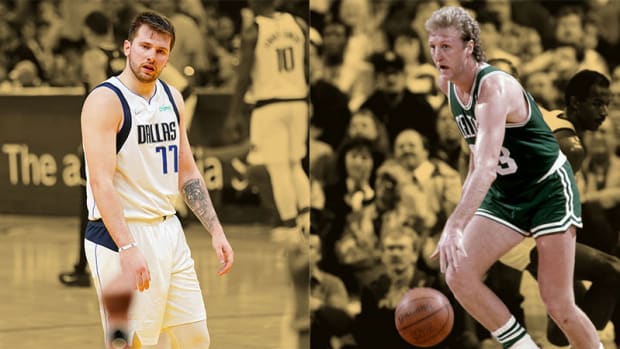 Dallas Mavericks guard Luka Doncic and Boston Celtics guard Larry Bird