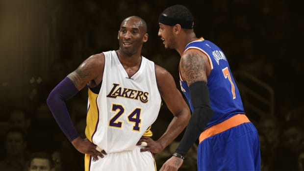 os Angeles Lakers forward Kobe Bryant talks with New York Knicks forward Carmelo Anthony