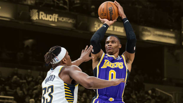 Los Angeles Lakers guard Russell Westbrook shoots the ball over Indiana Pacers center Myles Turner