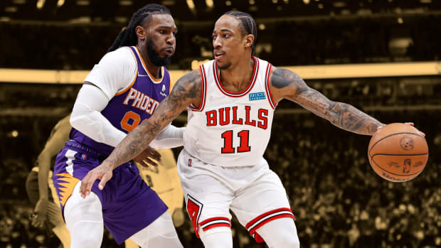 Phoenix Suns' forward Jae Crowder defending Chicago Bulls' star DeMar DeRozan