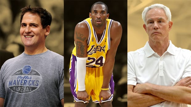 Dallas Mavericks owner Mark Cuban, Los Angeles Lakers guard Kobe Bryant, Los Angeles Lakers general manager Mitch Kupchak