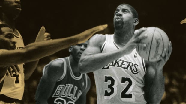 Los Angeles Lakers guard Magic Ervin Johnson and Chicago Bulls guard Michael Jordan