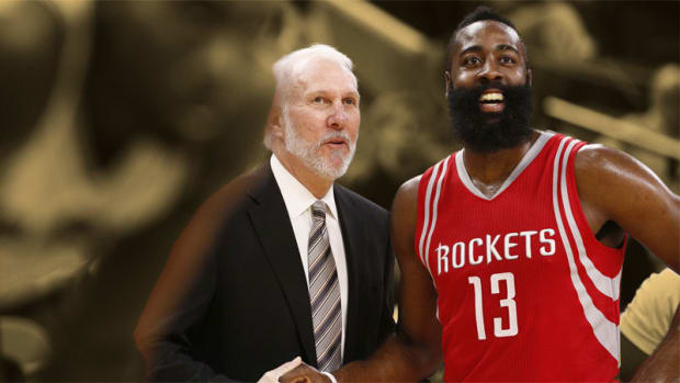 Houston Rockets shooting guard James Harden talks to San Antonio Spurs head coach Gregg Popovich