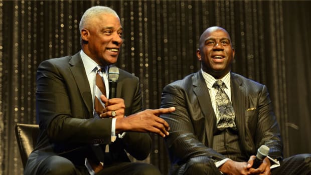 NBA legends Julius Erving and Magic Johnson
