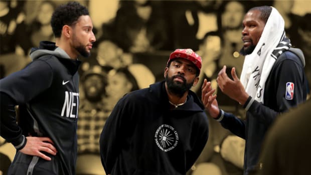 Brooklyn Nets guard Kyrie Irving, guard Ben Simmons and forward Kevin Durant
