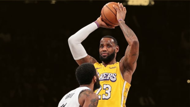 Los Angeles Lakers forward LeBron James and Brooklyn Nets guard Kyrie Irving