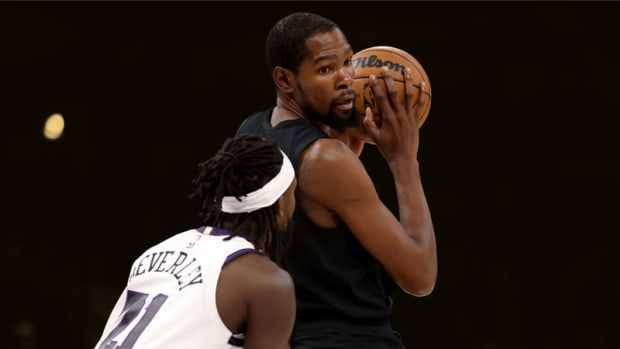 Brooklyn Nets forward Kevin Durant and Los Angeles Lakers guard Patrick Beverley