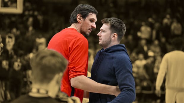 November 16, 2022; Boban Marjanović and Luka Doncic after the game at the American Airlines Center