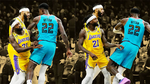 Los Angeles Lakers guard Patrick Beverley, center Anthony Davis and Phoenix Suns center Deandre Ayton