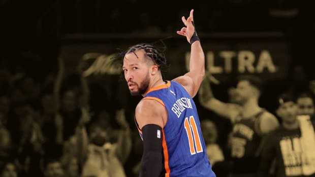 New York Knicks guard Jalen Brunson (11) celebrates his three point shot against the Los Angeles Lakers during the third quarter at Madison Square Garden.