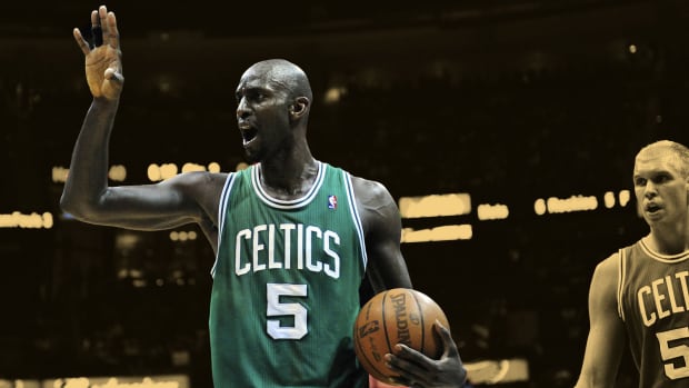 Boston Celtics power forward Kevin Garnett (5) reacts to a call d
