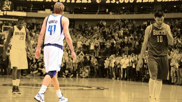  Dallas Mavericks power forward Dirk Nowitzki (41) makes a free throw during the second quarter against the Milwaukee Bucks at the American Airlines Center. Nowitzki becomes the 23rd player in NBA history to score at least 23,000 points.