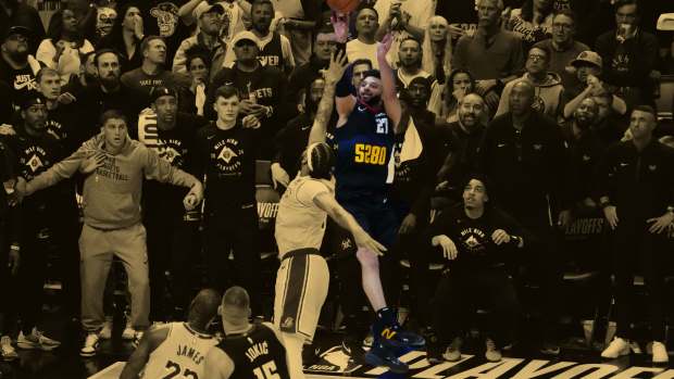 Denver Nuggets guard Jamal Murray (27) shoots over Los Angeles Lakers forward Anthony Davis (3) 
