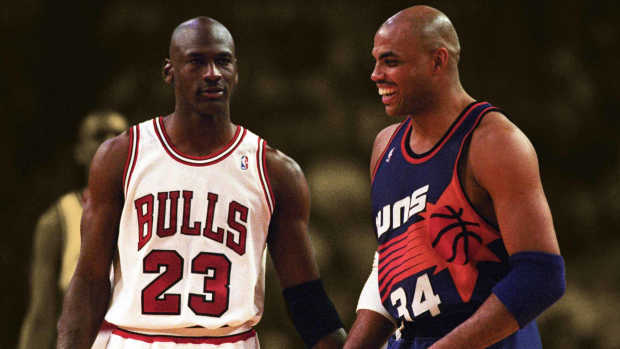 Chicago Bulls guard Michael Jordan (23) and Phoenix Suns player Charles Barkley