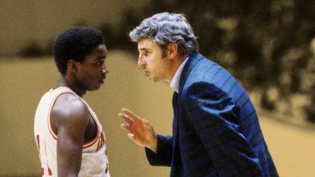  Indiana Hoosiers head coach Bobby Knight (right) talks with guard Isiah Thomas (11) on the sideline at Assembly Hall during the 1980-81 season. 