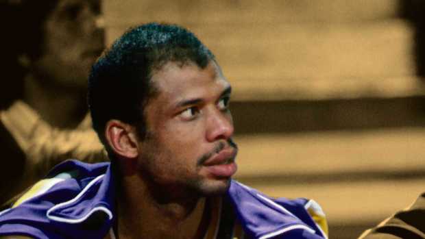 Los Angeles Lakers center Kareem Abdul-Jabbar (33) and Magic Johnson (32) on the bench against the Portland Trail Blazers at Memorial Coliseum.