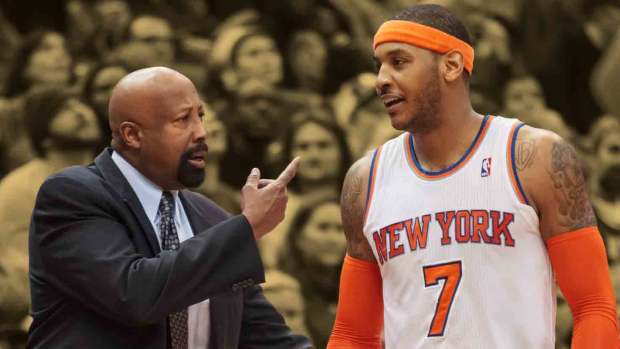 New York Knicks head coach Mike Woodson talks to forward Carmelo Anthony