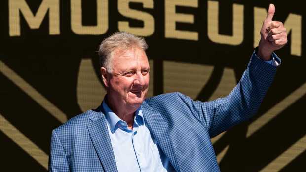 Larry Bird waves at the crowd gathered Thursday, May 30, 2024, for the grand opening ceremony of the Larry Bird Museum in Terre Haute, Indiana.  
