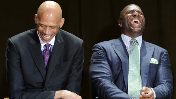 NBA players Kareem Abdul-Jabbar and Irvin "Magic" Johnson