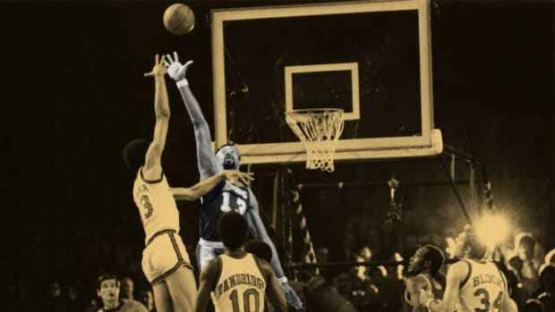 Sneaks - Hoops Culture - Wilt Chamberlain tries to block Kareem's