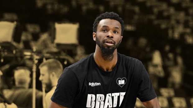 Golden State Warriors forward Andrew Wiggins (22) warms up before the game between the Dallas Mavericks and the Golden State Warriors at the American Airlines Center. 