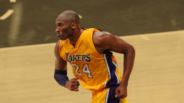 Apr 13, 2016; Los Angeles, CA, USA; Los Angeles Lakers forward Kobe Bryant (24) reacts after a basket against the Utah Jazz in the third quarter at Staples Center. Bryant played in the last game of his 20-year NBA career.