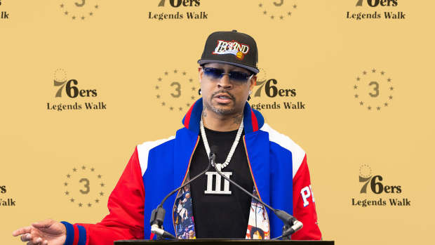  76ers great Allen Iverson speaks at the podium