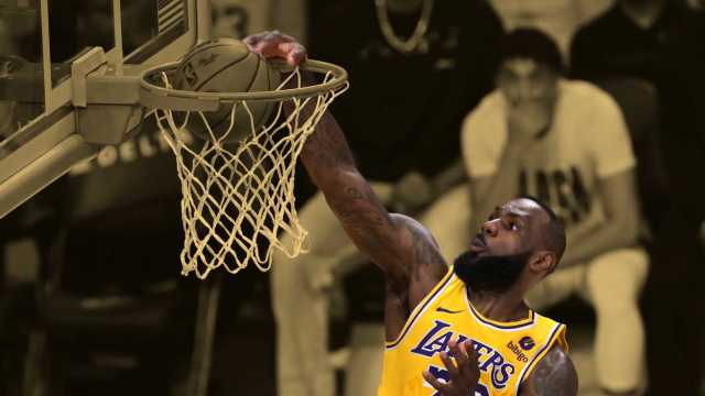 Los Angeles Lakers forward LeBron James (23) moves past Washington Wizards forward Deni Avdija (8) for a dunk in the first half at Crypto.com Arena. 